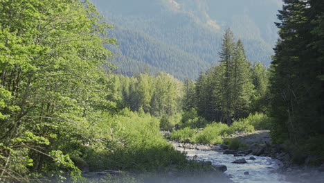 Wide-Shot-frame-within-a-frame-dolly-in-to-river-and-mountain-landscape