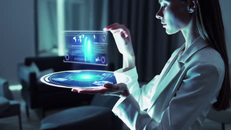 woman interacting with a holographic display