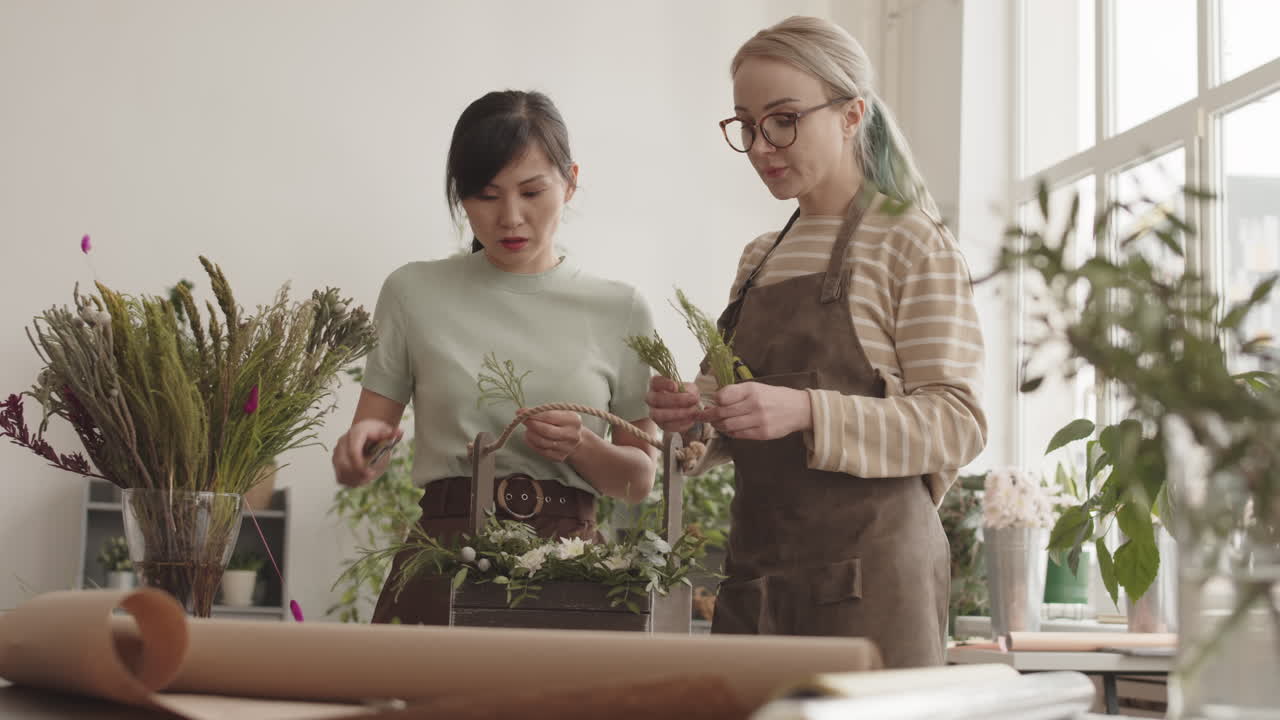 Women florists working on flower arrangement