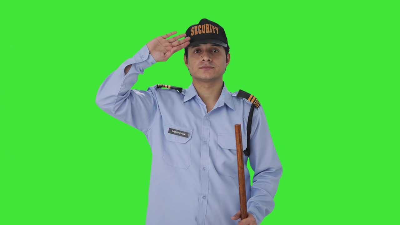 indian security guard saluting someone green screen | freepik