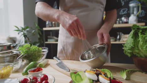 chef preparing a salad