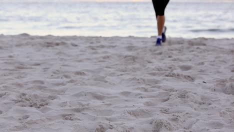 woman jogging on the beach