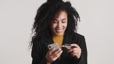 african american happy woman over white background.