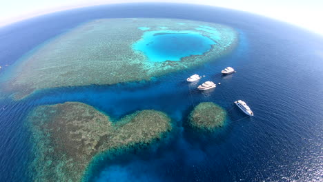 aerial drone shot for abu nuhas coral reef dive site in `the red sea of egypt