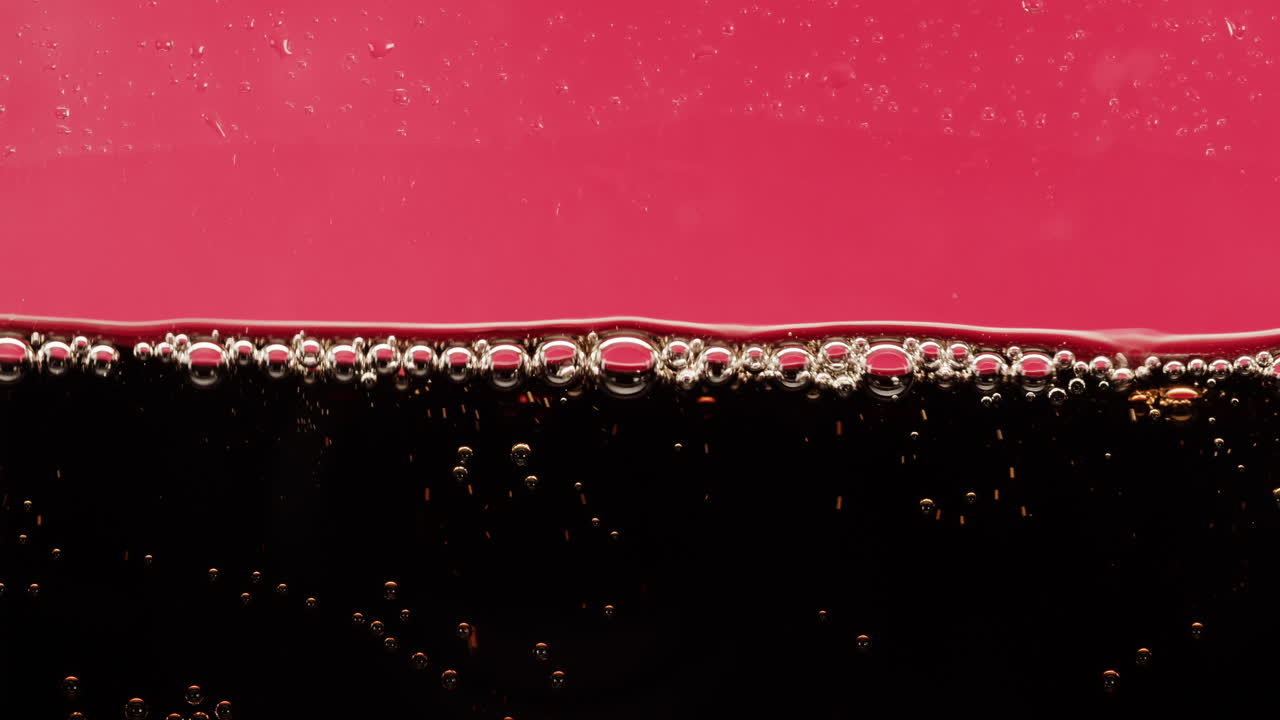 Close-up of Soda with Bubbles and Foam