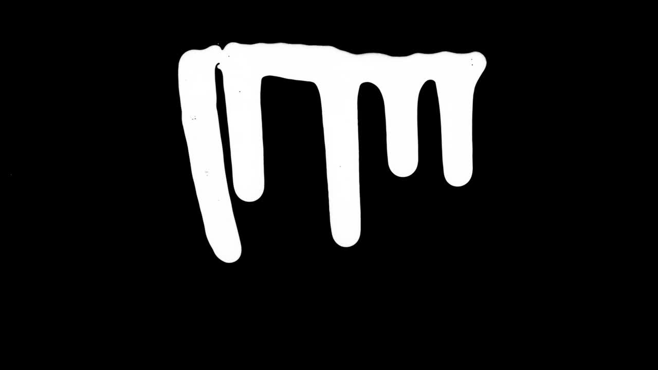 검은 화면 배경 위에  잉크가 흘러내린다