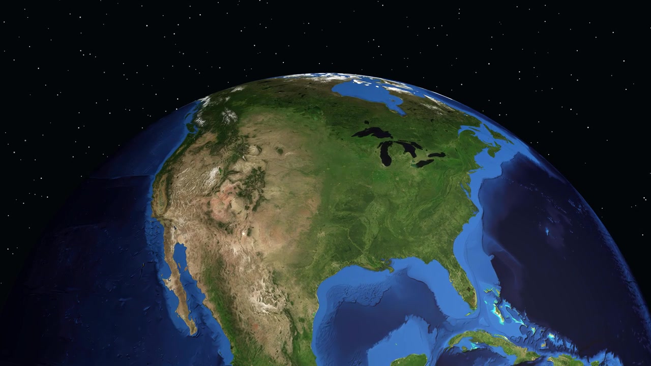 Digital animation zooms from space into North America, highlighting Manhattan Kansas with data overlays