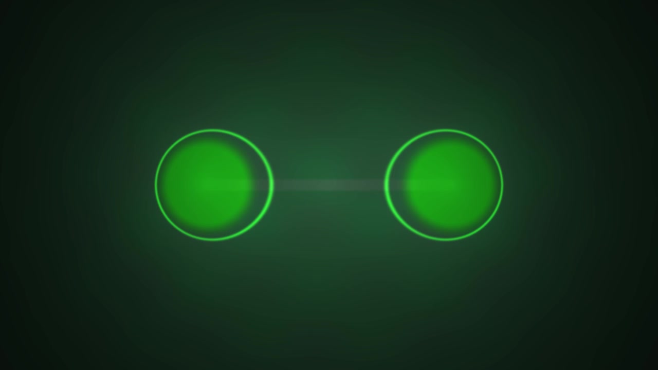 Abstract Green Glowing Circles Merging and Separating