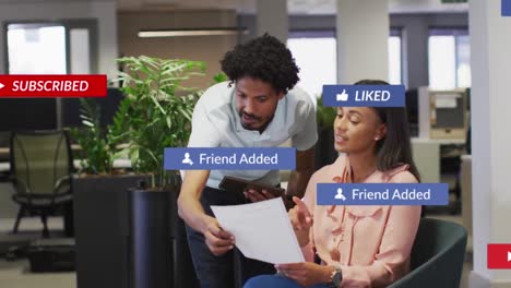 animation of social media text and icons over business people in office