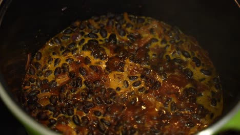 cooking black beans in a pot