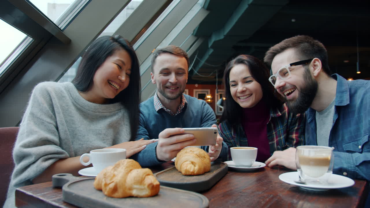 Friends Enjoying Coffee and Croissants