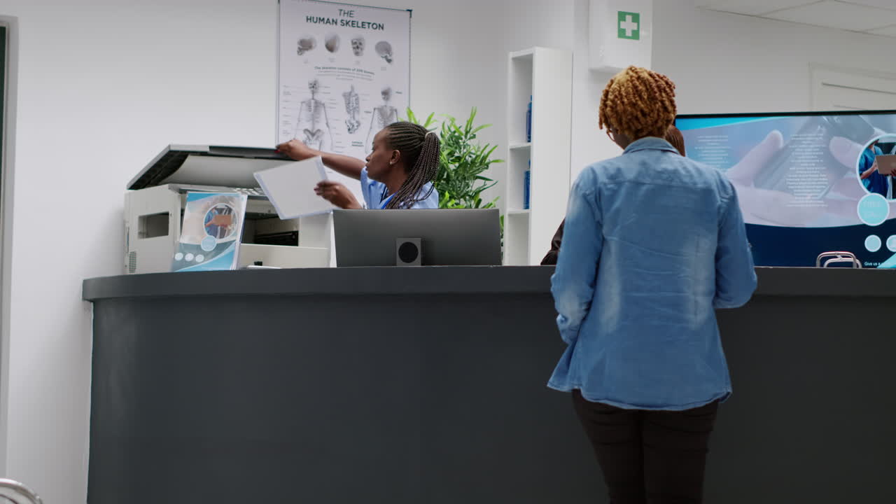 Hospital Reception Area with Patients and Staff
