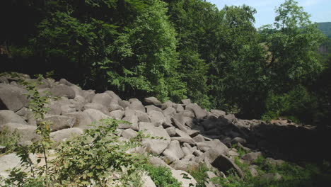 Felsenmeer-in-Odenwald-Sea-of-rocks-wood-nature-landscape-tourism-on-a-sunny-day-steady-shot