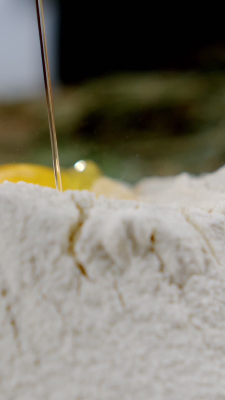 Preparing dough with egg and flour