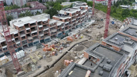 construction of new luxury apartments in a residential area,cranes