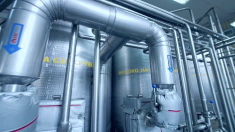 interior of dairy factory with fermentation tank. technology equipment at dairy farm. sterile production