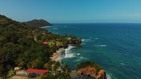 caribbean villas situated on a cliff overlooking a scenic coastline