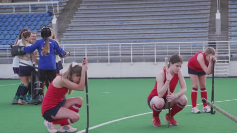 Female-hockey-players-sad-after-a-match-