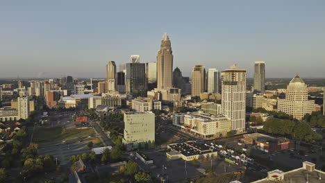 charlotte north carolina aerial v169 low flyover first ward around the city center, capturing downtown cityscape at sunrise, bathed in golden light - shot with mavic 3 pro cine - oct 1st 2023