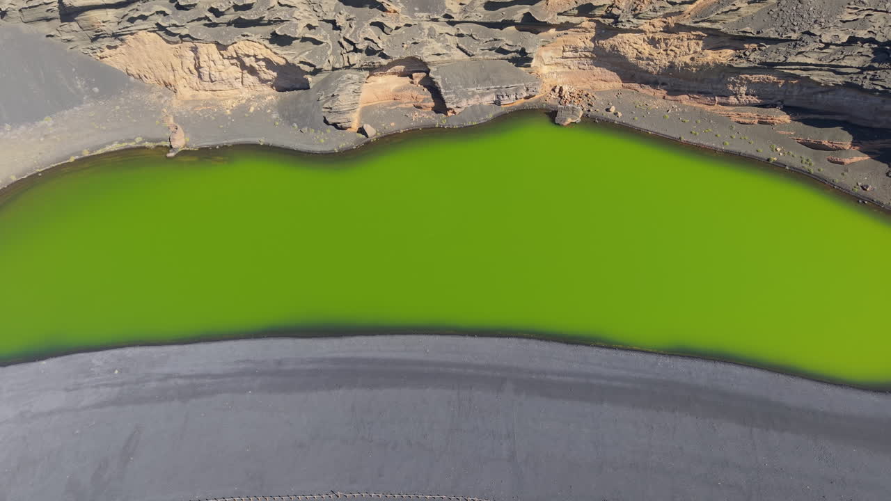 Green lagoon, also known as Clicos lagoon, located on the island of Lanzarote, Spain