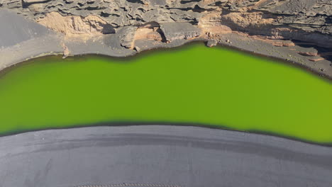 green lagoon, also known as clicos lagoon, located on the island of lanzarote, spain