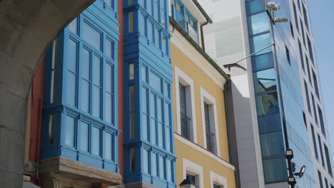 Typical-colored-houses-in-Gijon,-Asturias---Slider-shot