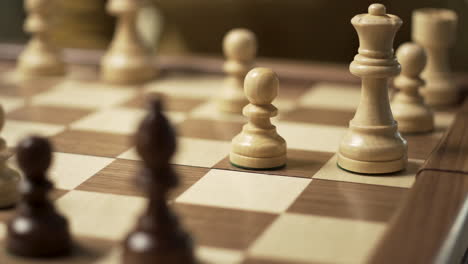 Closeup-shot-of-moving-of-a-chess-figure-on-a-chess-board