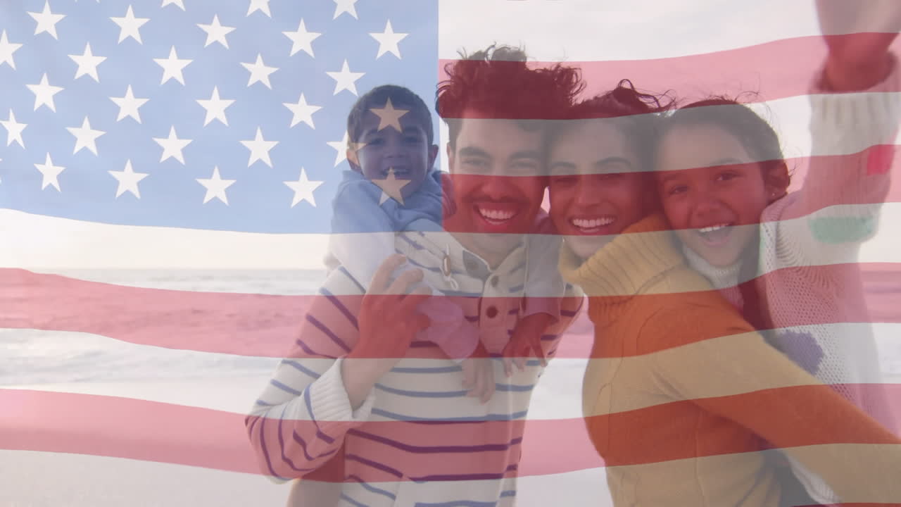 animación de la bandera de los estados unidos de américa sobre una pareja biracial que lleva a los niños a hombros