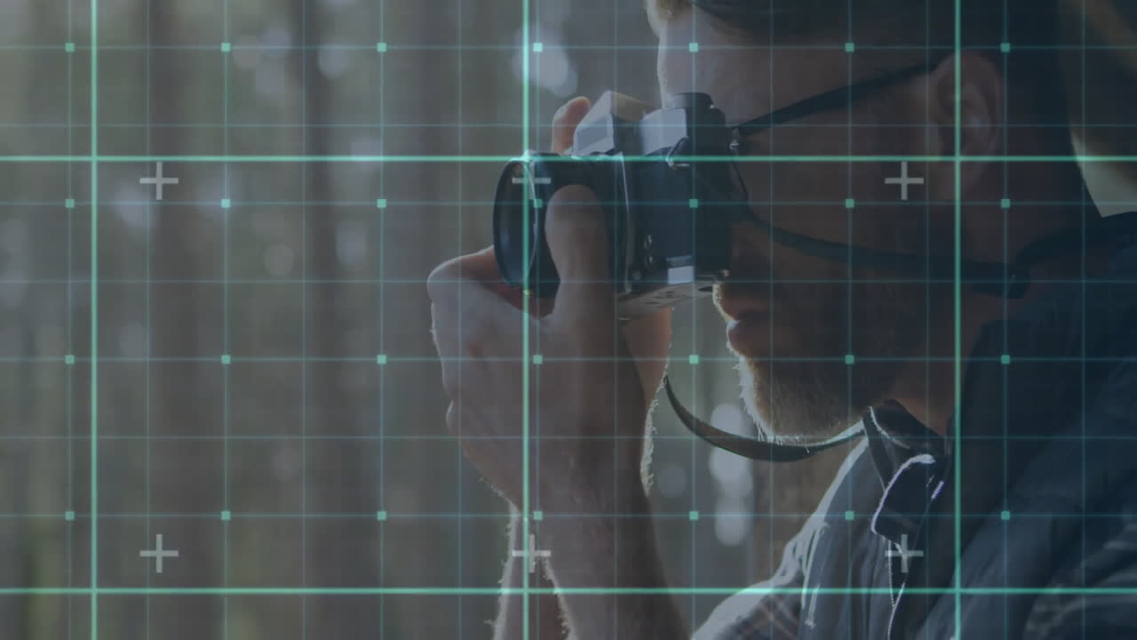 Using camera in forest, person capturing animation with digital grid overlay