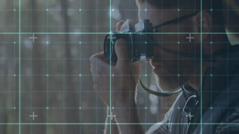 using camera in forest, person capturing animation with digital grid overlay