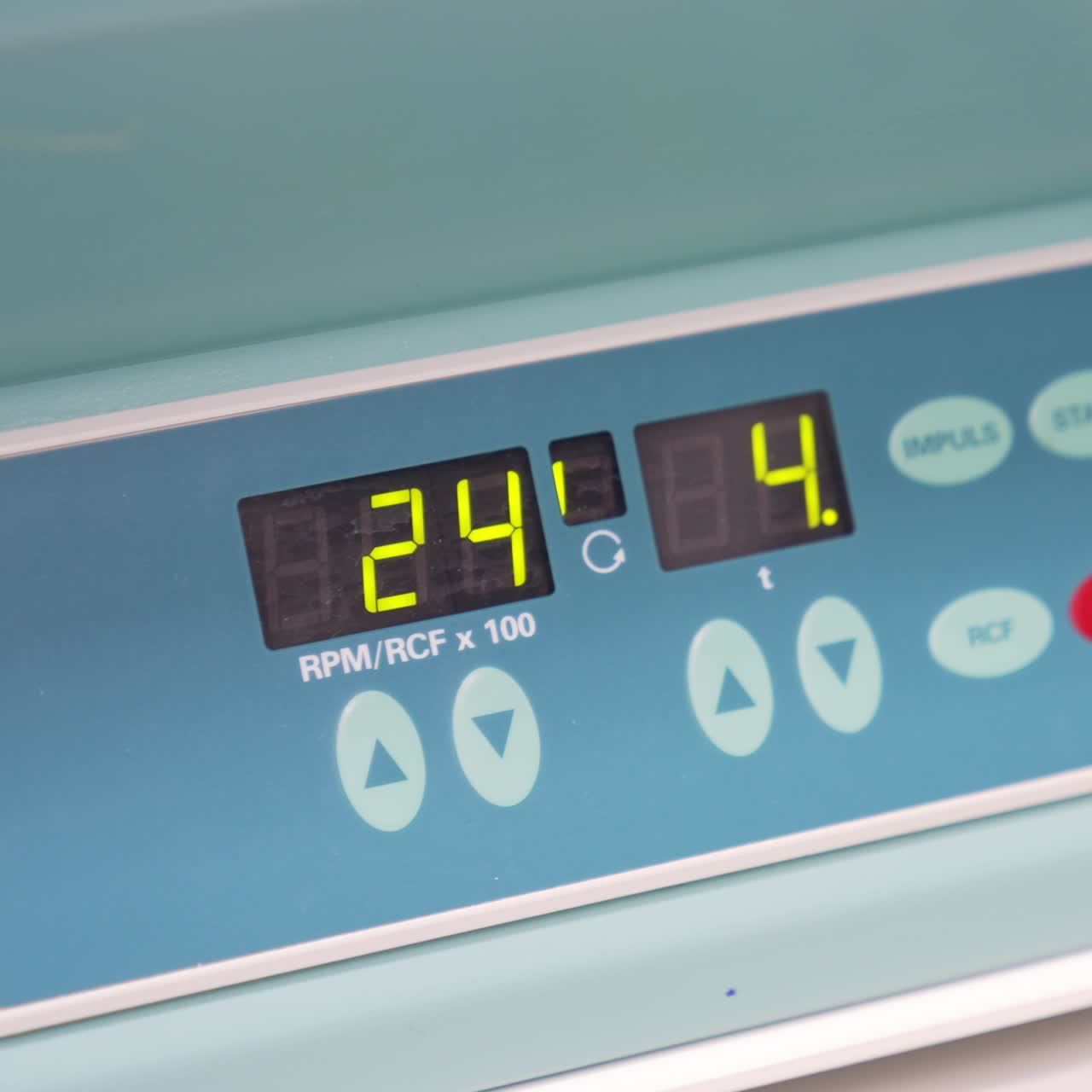 Indicator panel of a machine working in hospital laboratory. Close up. Figures changing quickly on the scoreboard