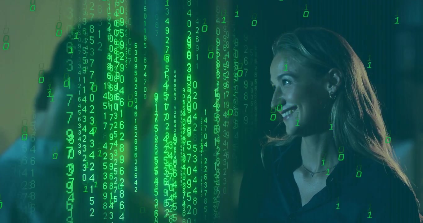 female engineer activating cascading code hologram while colleagues studying data in tech workspace