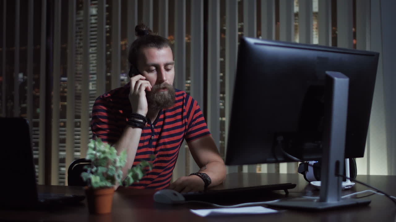 Man Working Late Night at Office