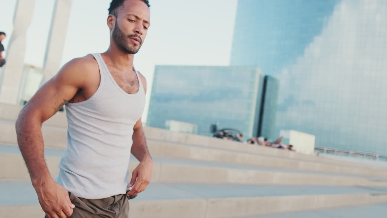 Man stretching outdoors in urban setting