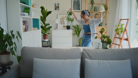 Girl-Dancing-with-Watering-Can