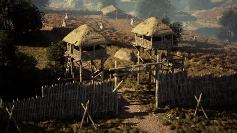 ancient village with watchtowers and fortifications