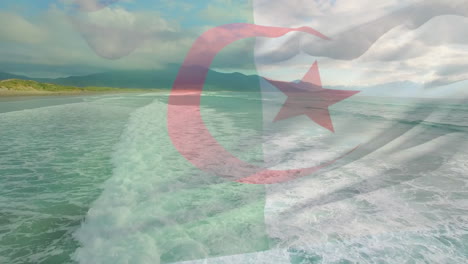 digital composition of algeria flag waving against aerial view of waves in the sea