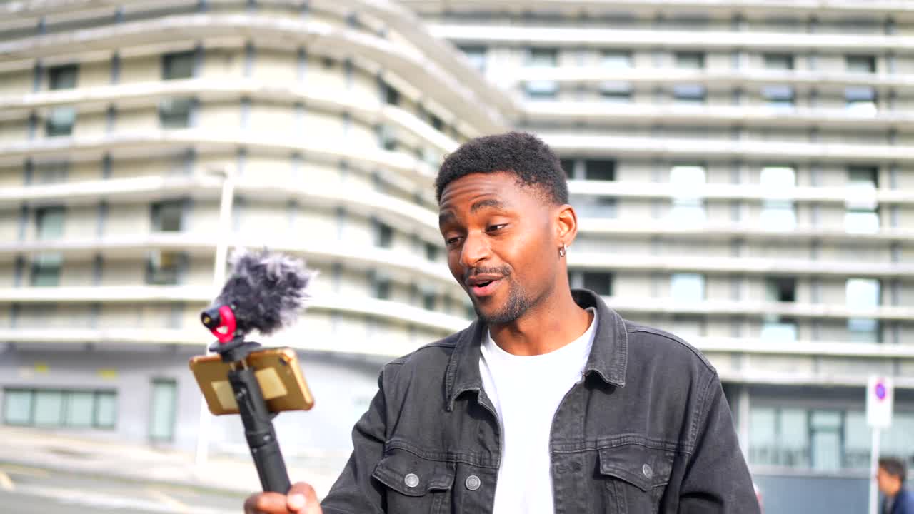 Man vlogging in urban setting