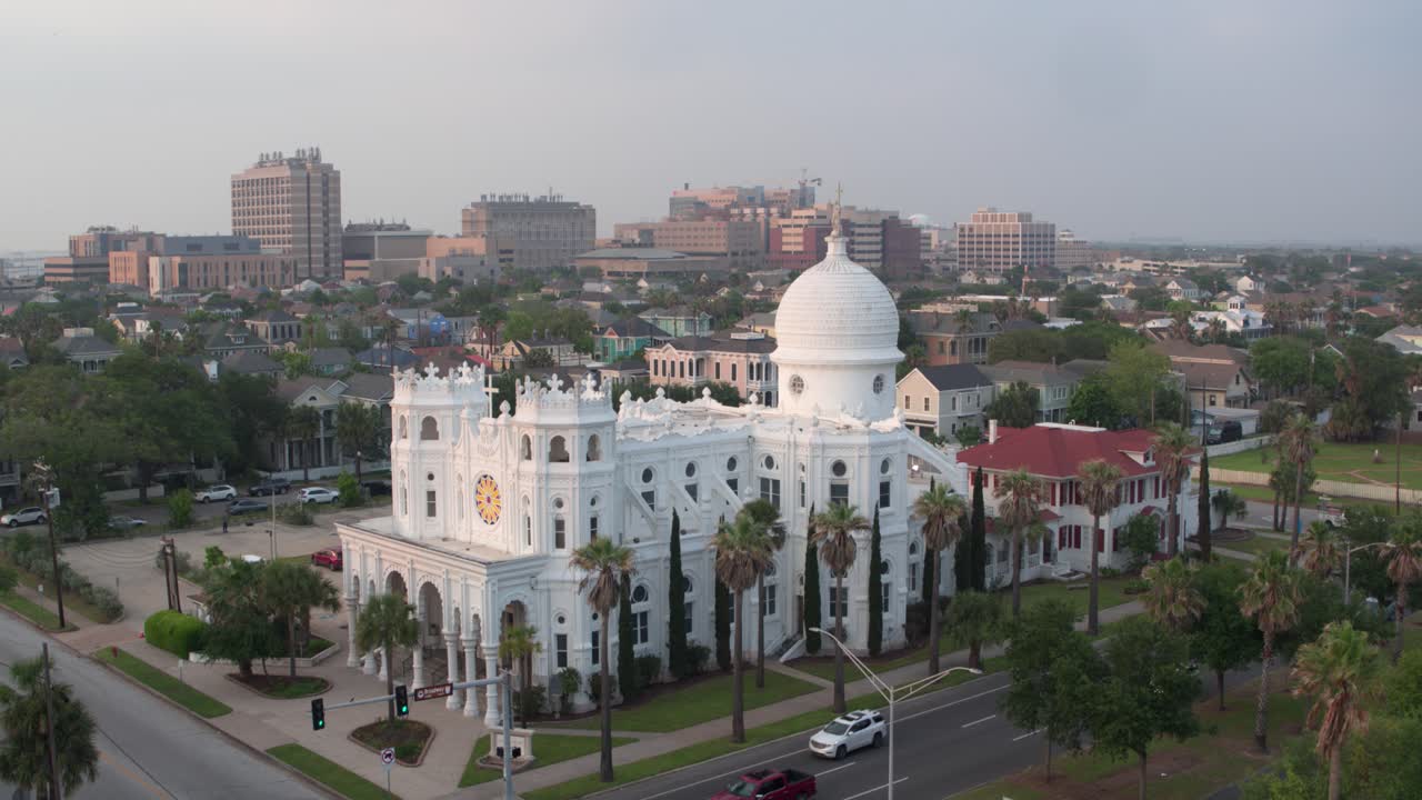 Drone view of Sacred Heart Catholic Church and surrounding area in Galveston, Texas