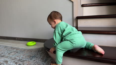 baby playing on stairs