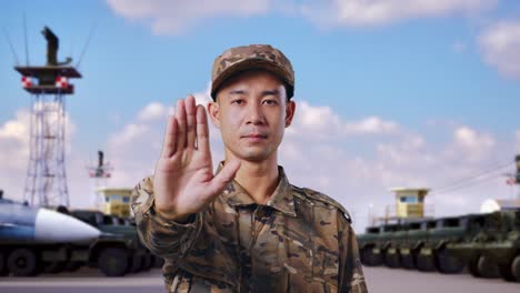 soldier signaling stop at military base