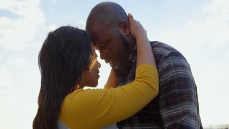 young couple embracing each other on a sunny day 4k