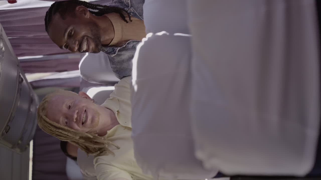 Friends Sharing a Happy Moment on a Trip