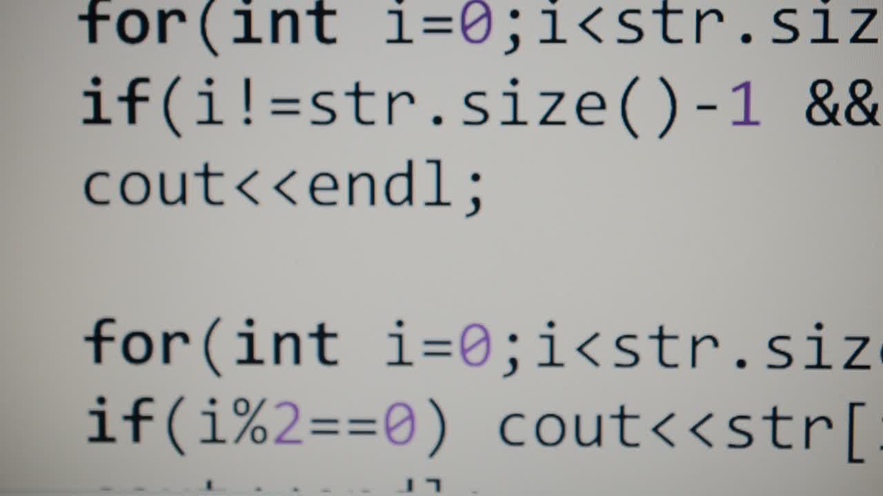 Source code on the monitor screen. Source code