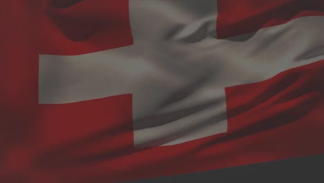 animation of flag of switzerland waving over fireworks