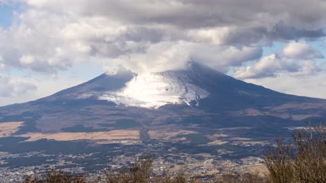 epic and beautiful timelapse of mount fuji and clouds during bright and sunny day