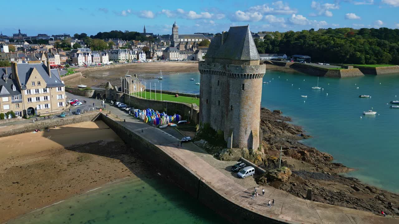Aerial View of Coastal Town with Stone Tower