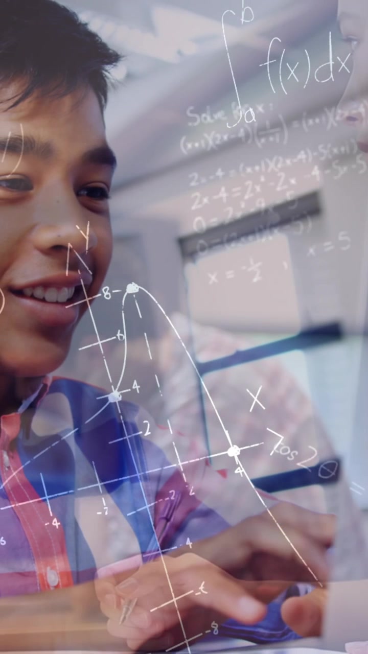 Animation of mathematical equations over schoolboy using laptop in classroom