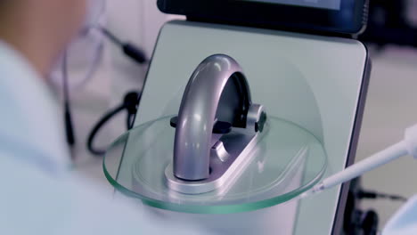 experience scientists or technicians loading a sample to centrifuge machine to analyzing. advanced research lab with modern equipment. drug vaccine development in professional biotechnology laboratory