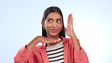 Hand-frame,-face-and-a-woman-on-a-studio